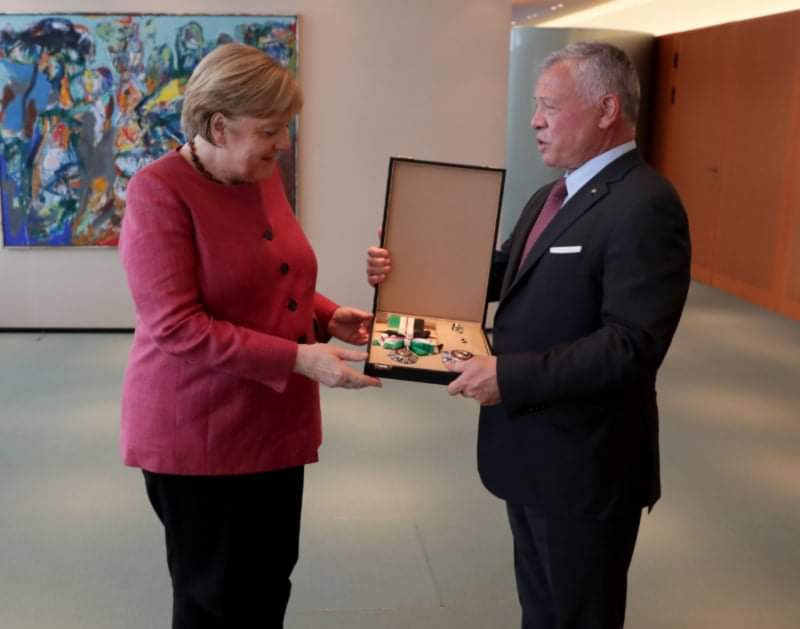 King bestows Order of Al Nahda on German chancellor, commends her years of leadership