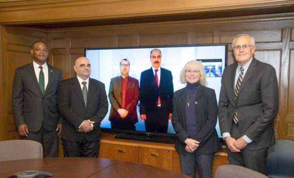 اتفاقية تعاون بين جامعتي اليرموك وايلمس كوليج الأميركية