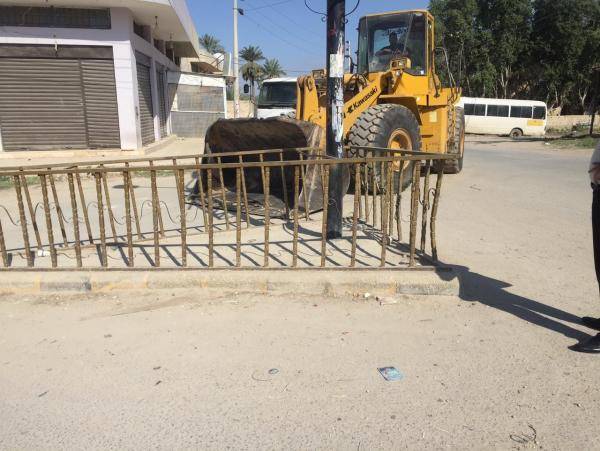 ازالة دوار مدخل الروضة في الشونة الوسطى (صور)