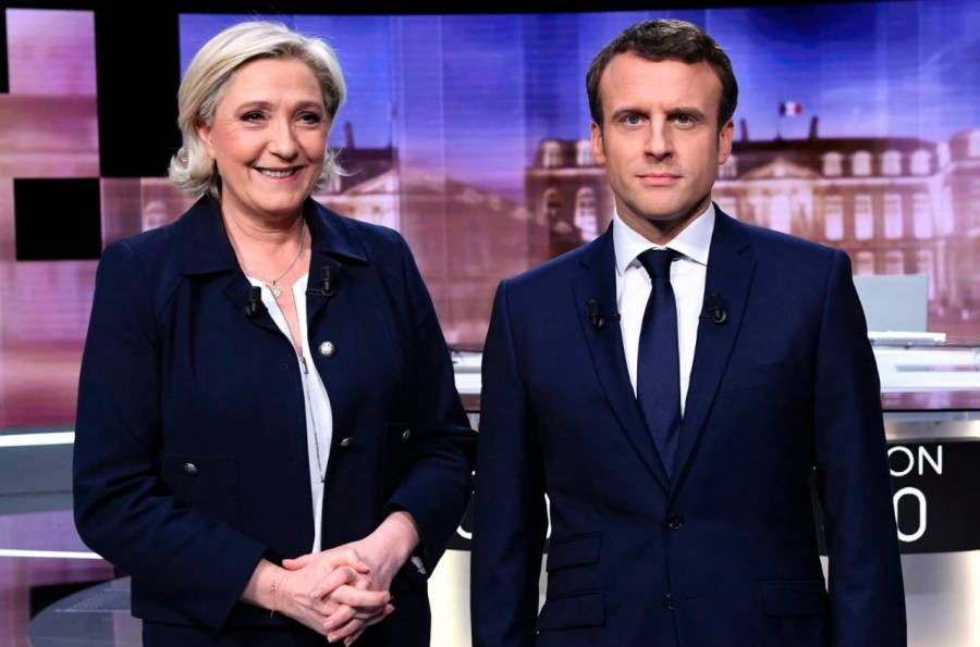 ماكرون يتقدم على لوبان في استطلاعات رأي بشأن جولة الإعادة