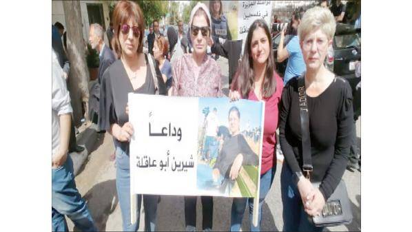 وقفة احتجاجية أمام مكتب «الجزيرة» فـي عمّـان استنكـارا لجـريمــة الاغتيــال