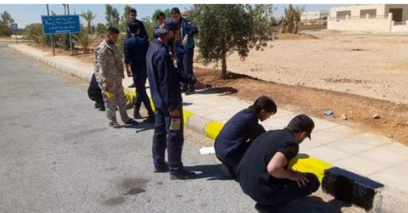 بلدية معان الكبرى تنفذ حملة لدهان الاطاريف