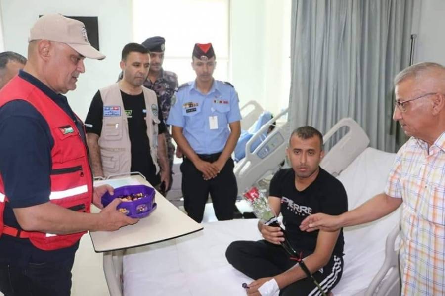 الشرطة المجتمعية يعودون مصابي العقبة