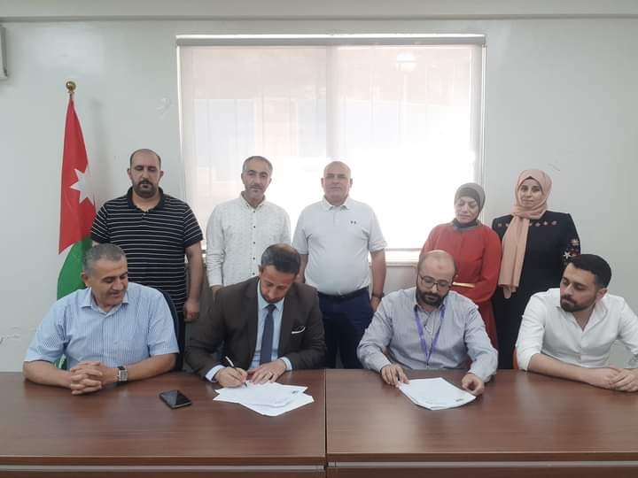 إتفاقية تعاون بين  بلدية عجلون الكبرى  والجمعية العلمية الملكية