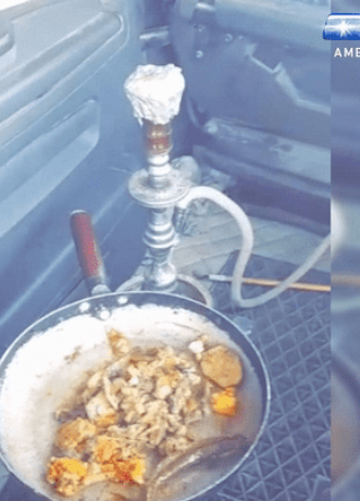 ضبط سائق اردني يطهو الطعام ويدخن الأرجيلة