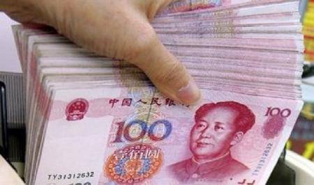 الصين تحدد سعر الدولار أمام اليوان عند 6.8698