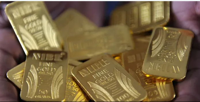 أداء متباين للذهب بسبب تراجع الدولار .. ومخاوف رفع الفائدة