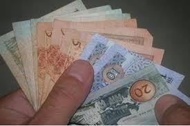 صرف الدفعات الشهرية لمنتفعي المعونة الوطنية الخميس