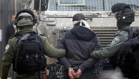 الاحتلال يعتقل 14 فلسطينيا بالضفة