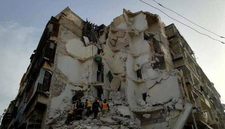 16 قتيلا في انهيار مبنى سكني بحلب السورية