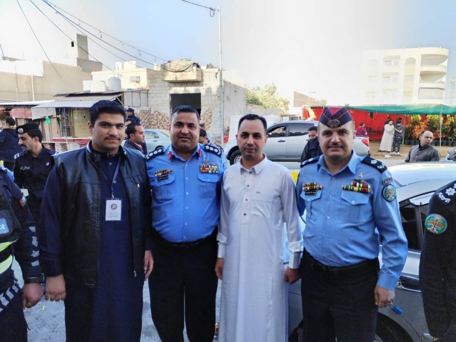 الشرطة توزع الحلوى في محافظة معان...صور