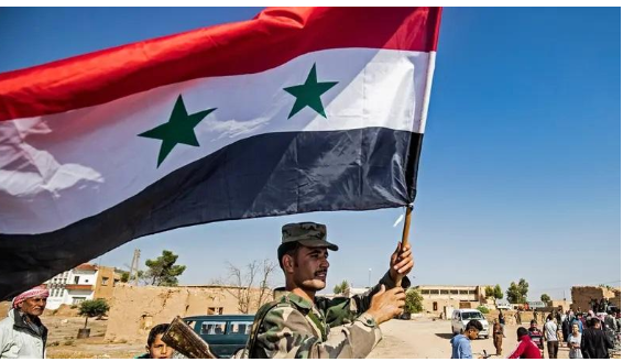 إنزال الأعلام الإيرانية في سوريا بأمر الحكومة