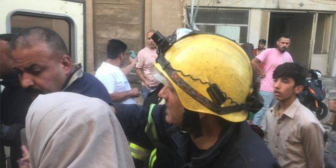 انقاذ 20 شخصاً بينهم أطفال بعد حريق اندلع وسط بغداد