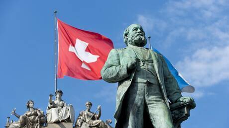 حرق العلم التركي ومجسم لأردوغان في سويسرا