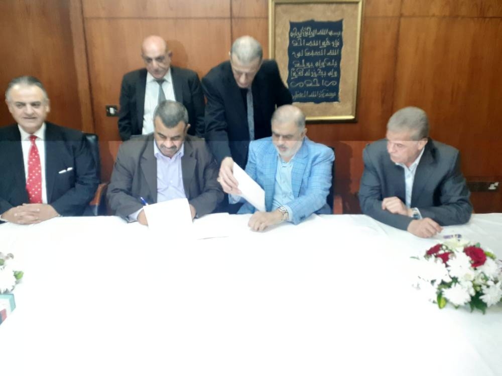 العدالة والاصلاح والإئتلاف الوطني يوقعان اتفاقية تعاون لتشكيل تيار وطني