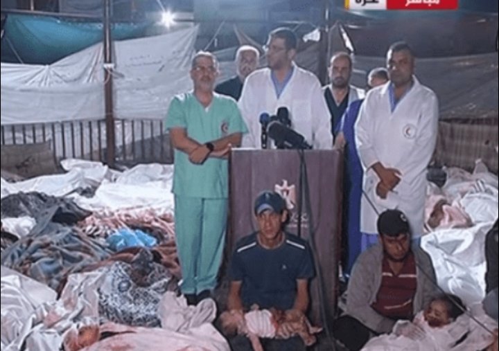 مؤتمر صحفي بين جثث أطفال غزة  صورة