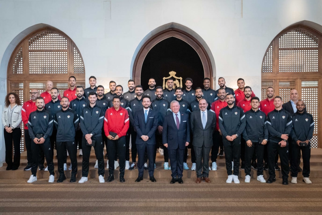 King receives national football team#44; bestows Silver Jubilee Medal on players#44; staff