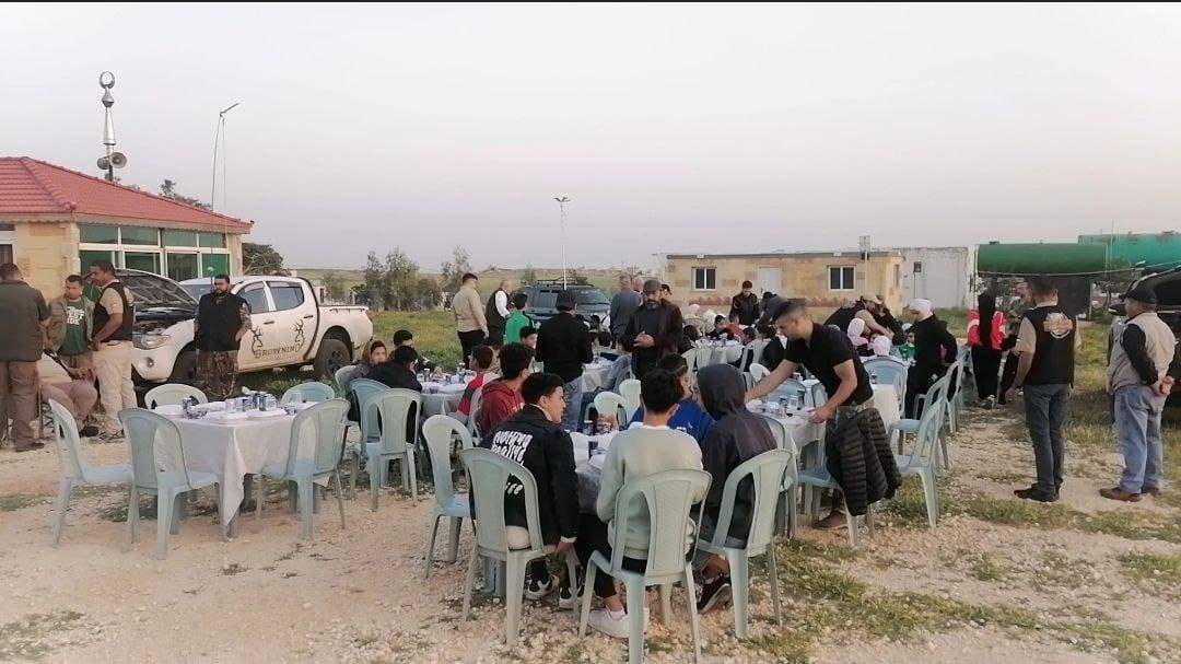 الجمعية الأردنية لرياضة الصيد تقيم افطار رمضاني لايتام مخيم حطين .