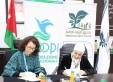 المعونة الوطنية يوقع اتفاقية مع كوبي لتعزيز برامج التمكين الاقتصادي