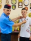 العميد قيس القبيلات يكرم اللاعب زيد البيطار بعد فوزه بذهبية بطولة الأمن العام للملاكمة 2026